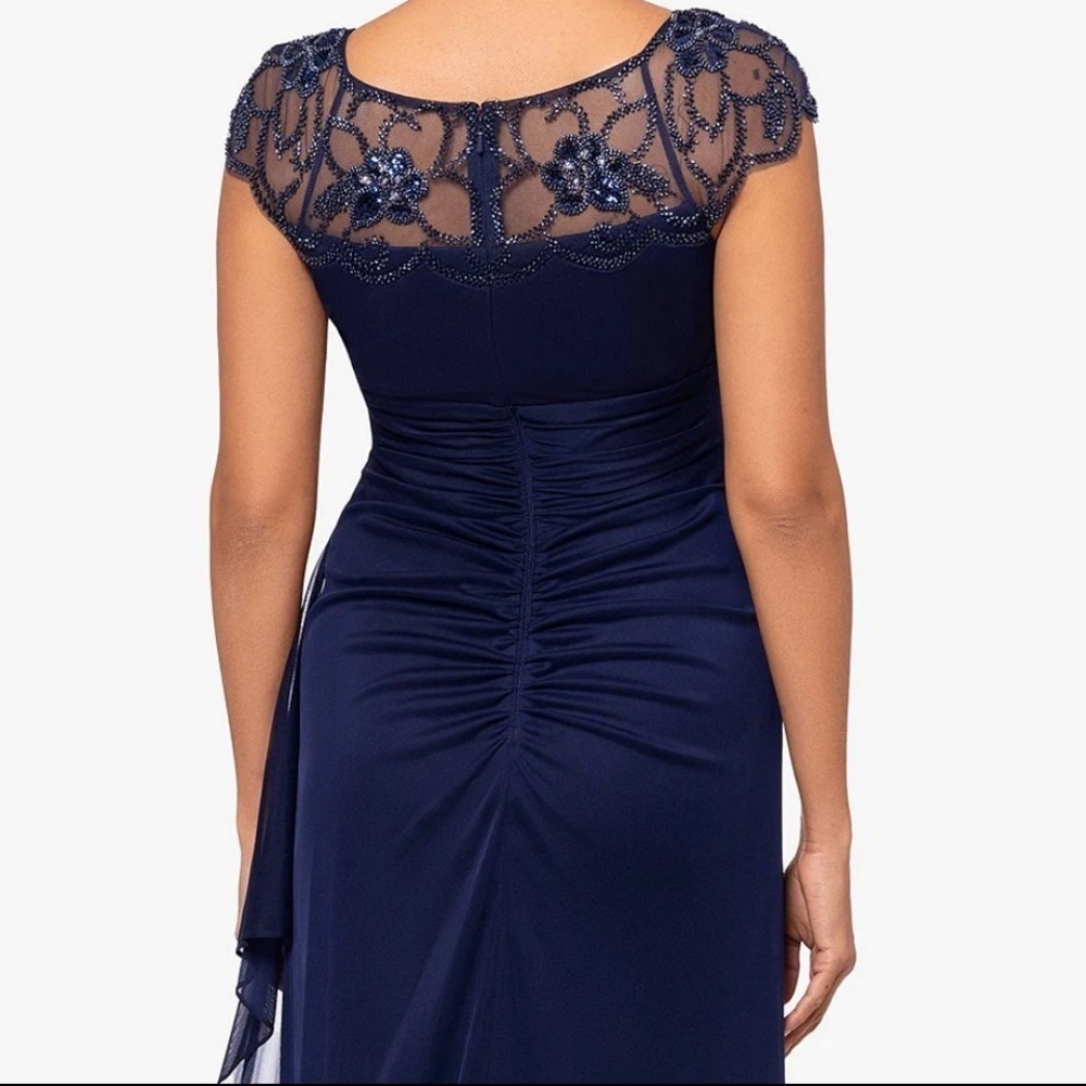 Xscape Beaded Yoke Cap Sleeve Round Neck Ruched Cascade Ruffle
Side Gown - Picture 10 of 12